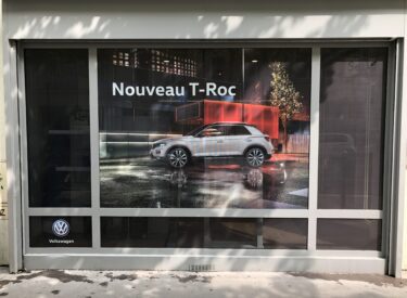 Adhésivage vitrine en microperforé Campagne T-roc x Volkswagen